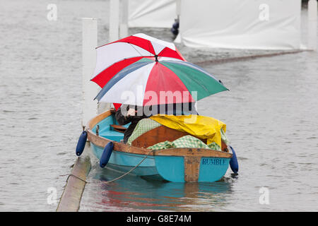 Henley on Thames , Oxfordshire, UK. 29th June, 2016. The opening day of Henley Royal Regatta saw alot of rain and umbrellas. UK weather. Credit:  Allan Staley/Alamy Live News Stock Photo