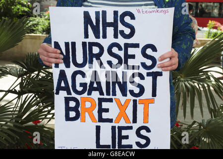London, UK. 02nd July, 2016. A woman holds a placard in central London' NHS NURSES AGAINST BREXIT LIES' as thousands protest the June 23 referendum for the UK to leave the European Union. Credit:  Thabo Jaiyesimi/Alamy Live News Stock Photo