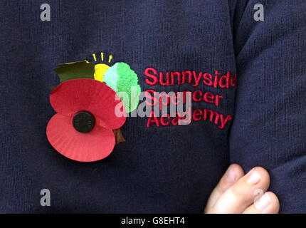 Two minutes silence is observed by pupils at Sunnyside Spencer Academy in Nottingham to mark Armistice Day, the anniversary of the end of the First World War. Stock Photo