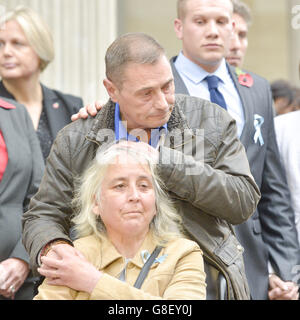 The stepmother of murdered schoolgirl Becky Watts and mother of her stepbrother Nathan Matthews, Anjie Galsworthy along with Becky's father Darren Galsworthy, listen to a statement being read to the media outside Bristol Crown Court, at the close of her murder trial, after Matthews was found guilty of murdering her during a sexually-motivated kidnap and his girlfriend Shauna Hoare was cleared of her murder but found guilty of manslaughter. Stock Photo