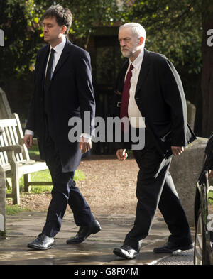 Labour leader Jeremy Corbyn (right) and his predecessor Ed Miliband attend the funeral of former Labour MP Michael Meacher at St Mary's Church in Wimbledon, London. Stock Photo