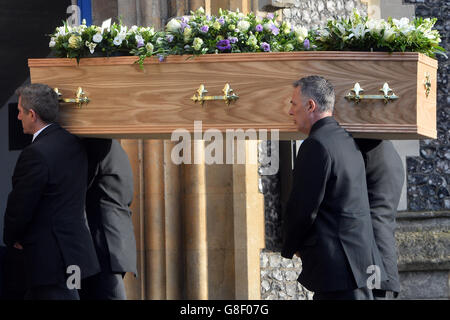 The coffin of former Labour MP Michael Meacher is carried into St Mary's Church in Wimbledon, London, ahead of his funeral. Stock Photo