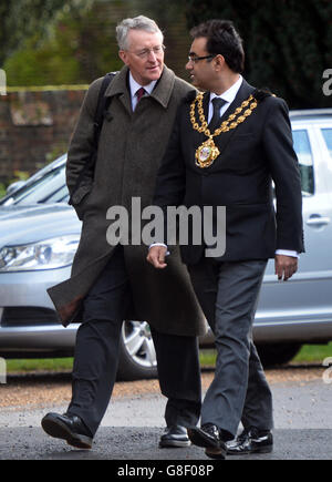 Shadow Foreign Secretary Hilary Benn (left) and Mayor of Oldham Ateeque Ur-Rehman attend the funeral of former Labour MP Michael Meacher at St Mary's Church in Wimbledon, London. Stock Photo