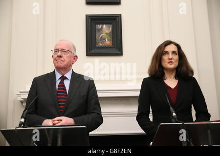 Northern Ireland Secretary Theresa Villiers and Irish Minister for Foreign Affairs Charlie Flanagan hold a press conference at Stormont House in Belfast. Stock Photo