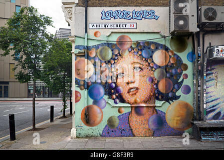 'Lounge Lover' by street artist  James Cochran  in Whitby Street, Shoreditch, East London, UK.