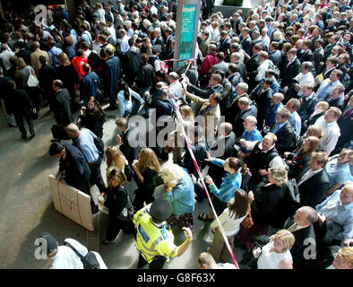 Commuters surge towards Liverpool Street Station as it re-open, after a terror attack at 8.51am this morning, when a bomb exploded in the tunnel near the station. Stock Photo