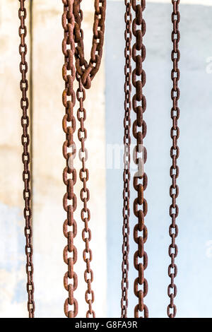 Hook and chains of an old industrial crane, Stock Photo