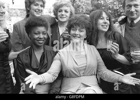 Cynthia Payne (centre) and friends at her Streatham home, where a party was given to launch the book of her life 'An English Madam, the Life and Work of Cynthia Payne'. On the right is the author of the book Paul Bailey. Stock Photo