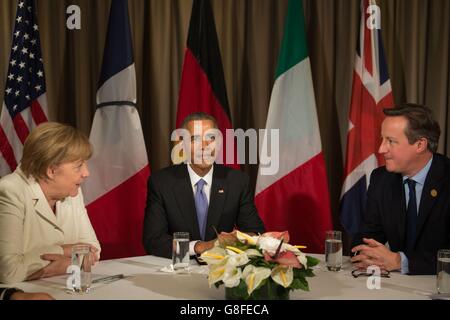 German Chancellor Angela Merkel, US President Barack Obama, and Prime Minister David Cameron at a meeting at the G20 Turkey Leaders Summit in Antalya, Turkey. Stock Photo