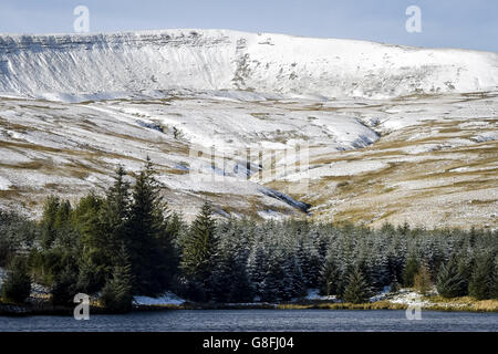 Mountains are dusted with a blanket of snow in the Brecon Beacons, Wales, as parts of the UK saw a flurry of snow overnight at the start of a wintry weekend which could see temperatures plummet to minus 5C. Stock Photo