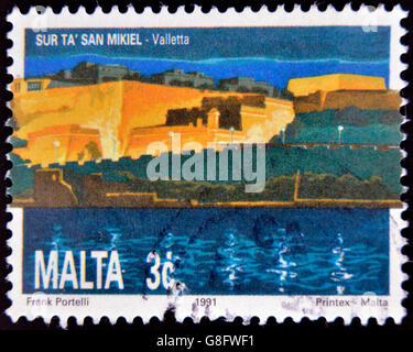 MALTA - CIRCA 1991: stamp printed in Malta shows St. Michael Bastion, Valletta, circa 1991 Stock Photo