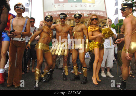 Revellers taking part in the Pride Parade. Organisers of Pride were hoping the huge numbers of people attending the Live 8 concert in Hyde Park would swell the numbers for the parade with record numbers expected at the event, rally and march. Stock Photo