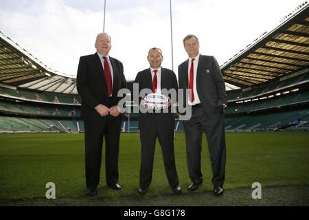 Newly confirmed England coach Eddie Jones (centre) alongside RFU Chief Executive Ian Ritchie and RFU Chairman Bill Beaumont (left) during a press conference at Twickenham Stadium, London. Stock Photo