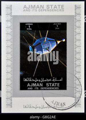 AJMAN STATE - CIRCA 1973: A stamp printed in United Arab Emirates (UAE) shows Explorer 20 series satellites, circa 1973 Stock Photo
