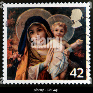 UNITED KINGDOM - CIRCA 2005: A stamp printed in the United Kingdom shows The Virgin mary with Infant Christ, circa 2005 Stock Photo