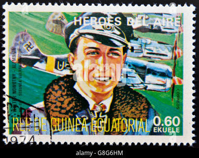 EQUATORIAL GUINEA - CIRCA 1974: stamp printed in Guinea dedicated to air heroes, shows Walter Nowotny, historic aviator Stock Photo