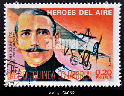 EQUATORIAL GUINEA - CIRCA 1974: stamp printed in Guinea dedicated to air heroes, shows Alexander Kazakov, historic aviator Stock Photo