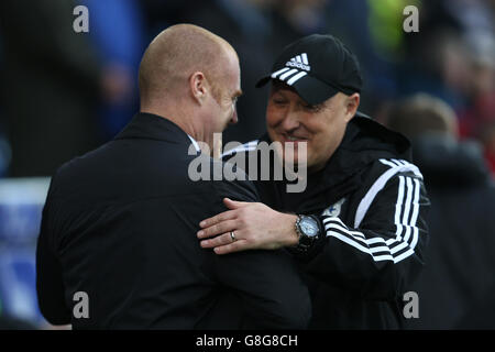 Cardiff v Burnley - Sky Bet Championship - Cardiff City Stadium. Burnley manager Sean Dyche (left) and Cardiff City manager Russell Slade greet each other before kick off Stock Photo