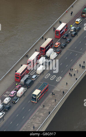 City Views from The Shard - London. General view of buses and commuters on London Bridge, London seen from the View at the Shard, London. Stock Photo