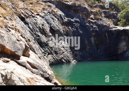 Serpentine Falls green swimming hole with rugged granite rock face in Serpentine, Western Australia. Stock Photo