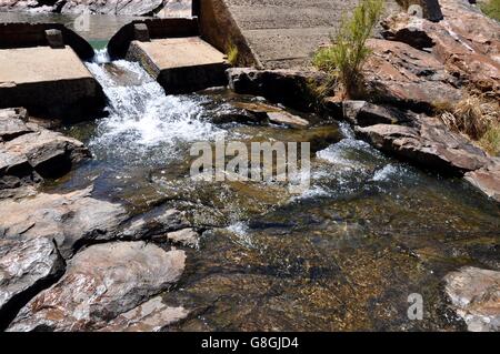 Spillway at the Serpentine Falls flowing into the granite rock pools in Serpentine, Western Australia. Stock Photo