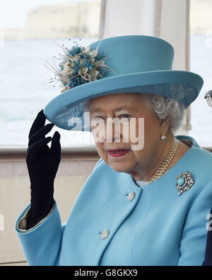 Queen Elizabeth tours the Grand Harbour in a traditional Maltese fishing boat. Stock Photo