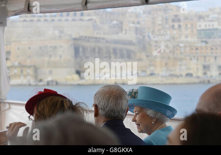 Queen Elizabeth tours the Grand Harbour in a traditional Maltese fishing boat. Stock Photo