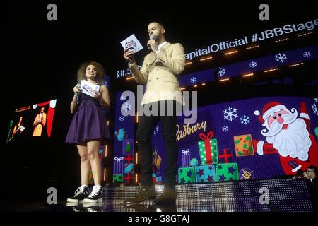 Capital FM presenters Pandora and Marvin Humes on stage during the Capital FM Jingle Bell Ball 2015 held at The O2 Arena, London Stock Photo