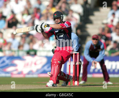 Cricket - Twenty20 Cup - Quarter Final - Lancashire Lightning v Derbyshire Scorpions - Old Trafford. Lancashire's Mal Loye hits a 4. Stock Photo