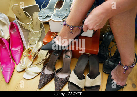 31,000 on shoes during her lifetime, research claimed. Around 44% of women say shoes are their biggest weakness when they are out shopping, with 86% of people claiming to buy at least one new pair a month, according to Churchill Home Insurance. Stock Photo