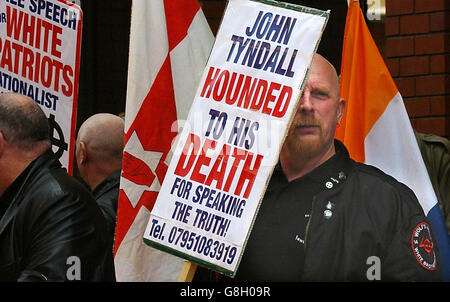 A supporter of recently deceased BNP founder John Tyndall watches BNP Leader Nick Griffin leave Leeds Crown Court. Griffin appeared alongside party activist Mark Collett, who denies eight similar charges. Both men were charged following a police investigation stemming from the broadcast of the BBC Secret Agent programme. Stock Photo