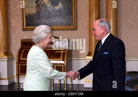 Australian Prime Minister John Howard has an audience with Queen Elizabeth II. Stock Photo