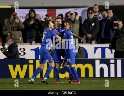 Hartlepool United's Rhys Oates (centre) celebrates scoring his side's first goal of the game from the penalty spot during the Emirates FA Cup, Second Round match at Moor Lane, Salford. Stock Photo