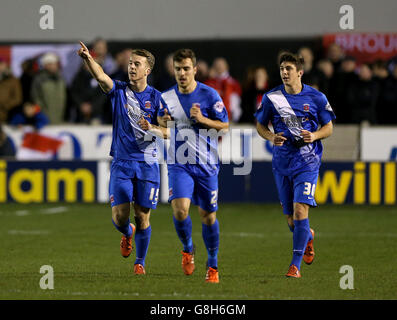 Hartlepool United's Rhys Oates (left) celebrates scoring his side's first goal of the game from the penalty spot during the Emirates FA Cup, Second Round match at Moor Lane, Salford. Stock Photo