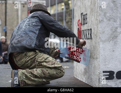 AK 47 returns Banksy's sculpture 'The Drinker' as 'The Stinker' to Shaftesbury Avenue in London 'with some notable amendments' a decade after being removed. Stock Photo