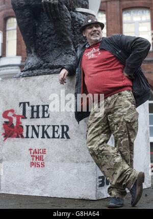 EDITORS NOTE CONTENT AK 47 returns Banksy's sculpture 'The Drinker' as 'The Stinker' to Shaftesbury Avenue in London 'with some notable amendments' a decade after being removed. Stock Photo