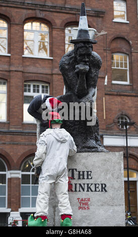 Banksy's sculpture 'The Drinker' has been returned as 'The Stinker' to Shaftesbury Avenue in London 'with some notable amendments' a decade after being removed. Stock Photo