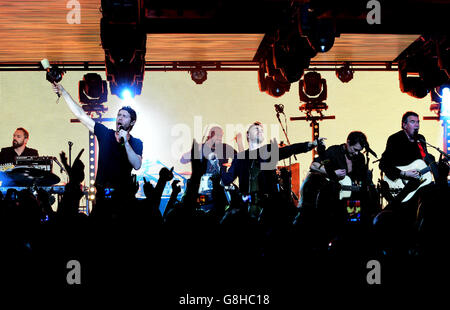 EDITORIAL USE ONLY Gary Barlow of Take That performing during filming