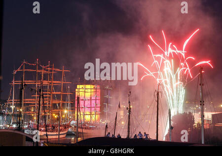 Crew members watch a fireworks display by the Quayside. Stock Photo