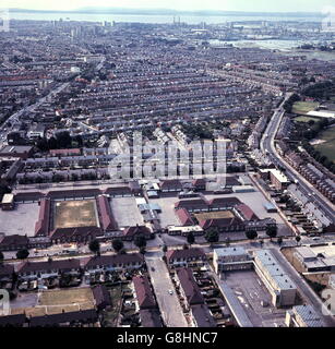 AJAXNETPHOTO. 23 JUNE, 1970. PORTSMOUTH, ENGLAND. AERIAL VIEW OF THE CITY LOOKING SOUTH WEST TOWARD THE HARBOUR. NORTH-END ROAD IS ON THE LEFT. TOWERS OF THE OLD SOUTHSEA POWER STATION ARE VISIBLE DISTANT TOP.  PHOTO:JONATHAN EASTLAND/AJAX  REF:C7009 1A Stock Photo