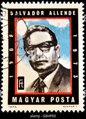 HUNGARY - CIRCA 1974: A stamp printed in Hungary shows Chilean President Salvador Allende, circa 1974 Stock Photo
