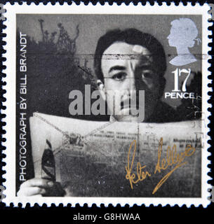 UNITED KINGDOM - CIRCA 1985: A stamp printed in Great Britain shows Peter Sellers - Photograph by Bill Brandt, circa 1985 Stock Photo