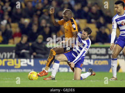 Wolverhampton Wanderers' Benik Afobe (Left) is tackled by Reading's Oliver Norwood (Centre). Stock Photo