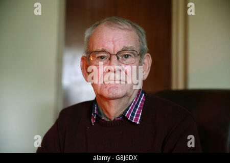 Kingsmill survivor Alan Black with his dog Libby at his home in Bessbrook, Co. Armagh, who has said that the slaughter of 10 Protestant workmen in Northern Ireland exactly 40 years ago should never be forgotten. Stock Photo