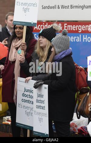 Junior doctors on the picket line outside Sandwell General Hospital in West Bromwich as a doctors go on strike for 24 hours in a dispute with the government over new contracts. Stock Photo