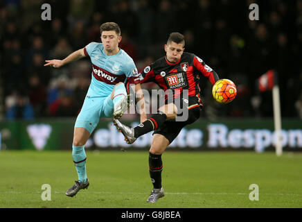West Ham United's Aaron Cresswell and AFC Bournemouth's Juan Itrube battle for the ball during the Barclays Premier League match at the Vitality Stadium, Bournemouth. PRESS ASSOCIATION Photo. Picture date: Tuesday January 12, 2016. See PA story SOCCER Bournemouth. Photo credit should read: Adam Davy/PA Wire.
