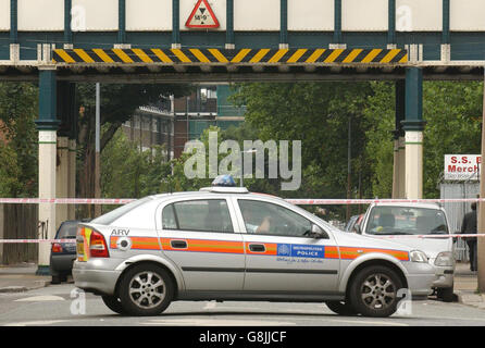 A police cordon around the Capworth Street area of Leyton in east London where a man was stabbed to death during a street fight yesterday. Officers were called at 7.30pm last night to reports of a brawl between numerous black youths at the junction of Capworth Street and Dunton Road. The victim, who was also black and in his 20s, got caught up in the fight and was stabbed. Stock Photo