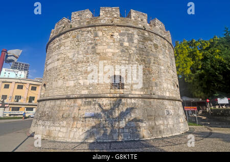 Circular tower of Durres Castle with palm tree shadow, 5th century Byzantine castle in Durres Albania Stock Photo