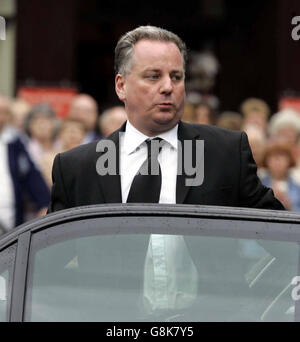 Scottish First Minister Jack McConnell arrives for former Foreign Secretary Robin Cook's funeral. Mr Cook, 59, died on Saturday while on a walking holiday with his wife Gaynor in northern Scotland. Stock Photo