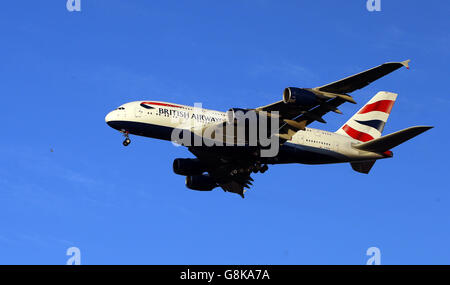 A British Airways Airbus A380-841 plane with the registration G-XLEE lands at Heathrow Stock Photo